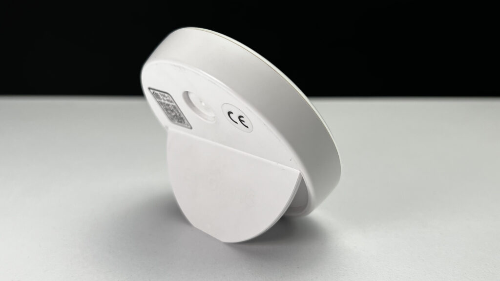 the back of the sensor showing its folding kickstand extended supporting the sensor for use on a horizontal surface